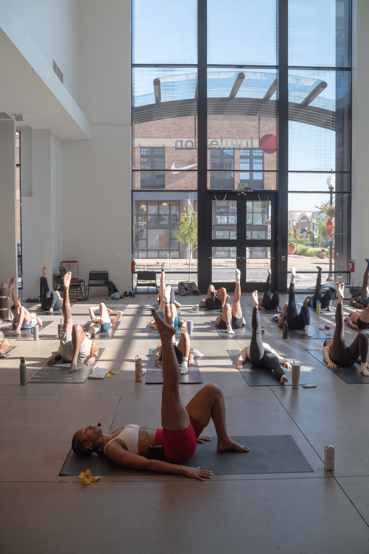 High-energy indoor fitness class with a charismatic instructor